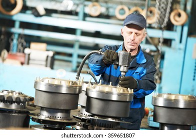 assembler worker at tool workshop - Shutterstock ID 359651807