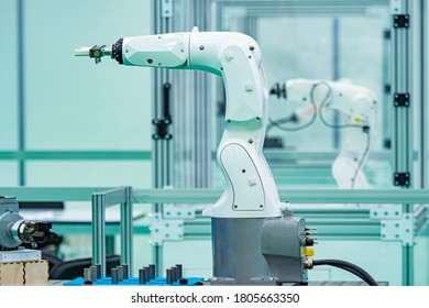 Assembly Robots Are Being Tested In The Laboratory. Industrial Robots For The Assembly Of Devices. Adjustment Of Industrial Equipment. The Engineering Lab Is Empty. Engineering And Design Bureau.