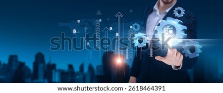 Assessment: Evaluation, analysis, feedback, performance, growth, appraisal, measurement, improvement. Businessman hand holds assessment icon and network on digital interface.