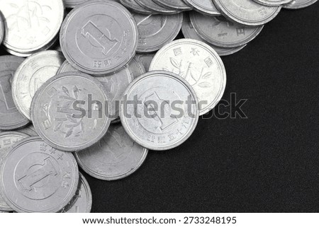 Asset formation expressed by stacking Japanese 1 Yen Coins.