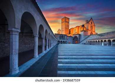 Assisi, San Francesco or Saint Francis Basilica church at sunset. Perugia, Umbria, Italy, Europe.