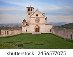 Assisi, Umbria, Italy: Basilica of Saint Francis (Italian: San Francesco) the ancient Catholic church that houses the tomb of the saint, an artistic masterpiece and place of religious pilgrimage

