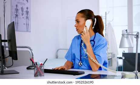 Assistant doctor talking with patient on phone from hospital about diagnosis, making appointments. Healthcare physician in medicine uniform, receptionist doctor helping with telehealth communication