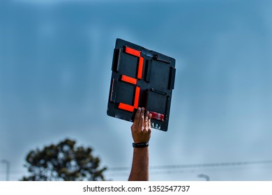 Assistant Football Referee Shows Extra Time