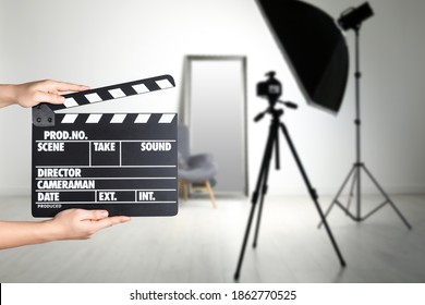 Assistant Holding Clapperboard On Filming Location, Closeup. Cinema Production 