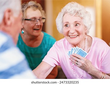 Assisted living, senior woman and poker with friends playing cards in retirement home together. Community, competition or game with happy elderly people in apartment for bonding, fun or leisure - Powered by Shutterstock