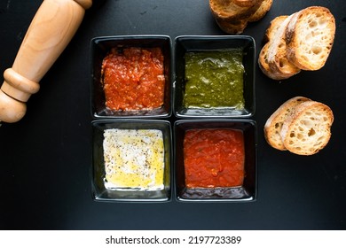 Assoerted Dippings, Guacamole Dip, Dipping Sauce, Guacamole Sauce, Chili Dip, With Bread Served In A Dish Isolated On Dark Background Top View Of Italian Food