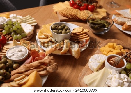 Assorted appetizers served on wooden table, closeup Foto d'archivio © 