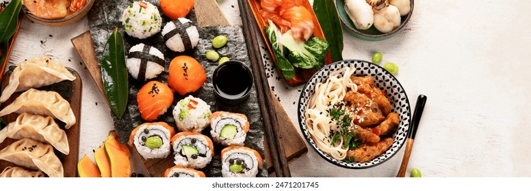 Assorted asian dishes and snacks on a white background. Traditional food concept. Top view. Panorama with copy space. - Powered by Shutterstock