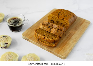 Assorted Baked Goods Of Bread And Muffins