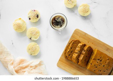 Assorted Baked Goods Of Bread And Muffins