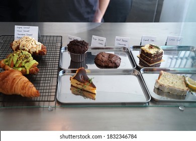 Assorted Bakery Pastry Display Box- Pistachio Nut, Almond And Butter Croissant, Poppy Seed Cake, Brownie Cupcake,, Basque Cheesecake, Carrot Cake And Chocolate Chips Cookies