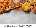 Assorted Beer Stands: chips, nuts, pretzels. Diverse Options for Refreshment with copy space