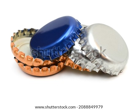 Assorted bottle caps isolated on white