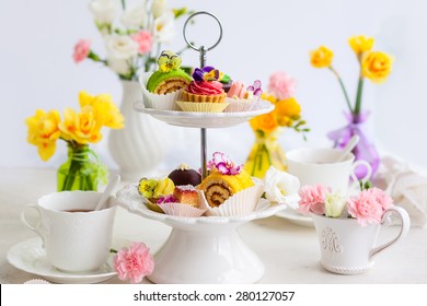 Assorted Cakes And Pastries On A Cake Stand For Afternoon Tea