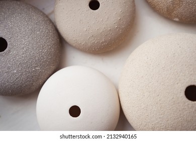 Assorted Ceramic Wares Arranged On Table In Pottery Studio