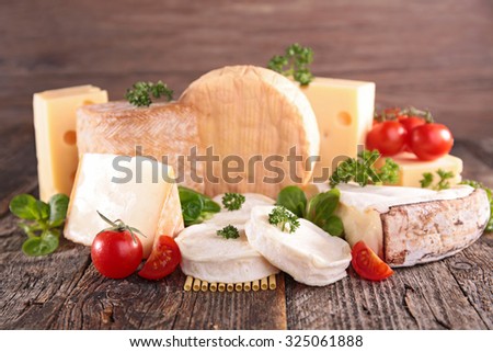 Similar – Assortment of cheeses and wine on wooden table