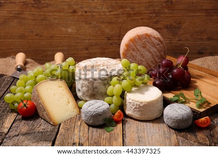 Similar – Assortment of cheeses and wine on wooden table