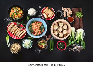 Assorted Chinese Food On Dark Background. Asian Food Concept. Top View, Flat Lay