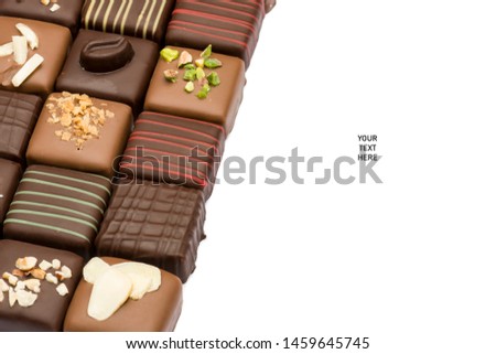 assorted chocolates confectionery with copy space, on white background