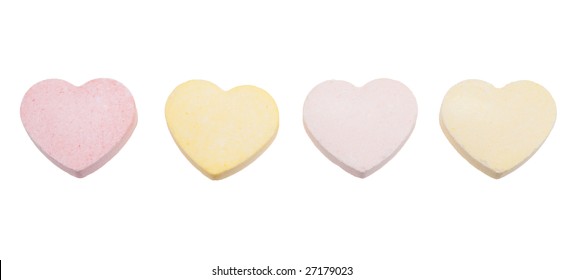 Assorted colors of blank candy hearts isolated on a white background