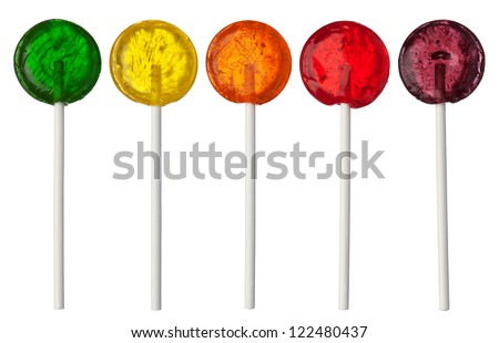 Assorted colors lollipops isolated on white background, close-up. This image is isolated with light during the photo shoot process.