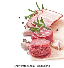 Assorted Deli Meats, Rosemary And Pepper, Isolated On White