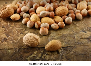 Assorted dried fruit on brown background