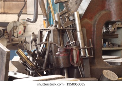 Assorted engineering tools on a bench