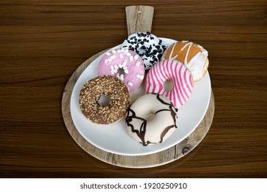 Assorted filled donuts on a table 