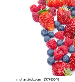 Assorted Fresh Berries Isolated On A White Background