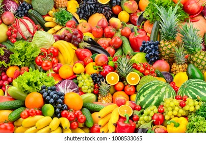 Assorted fresh ripe fruits and vegetables. Food concept background. Top view. Copy space. - Shutterstock ID 1008533065