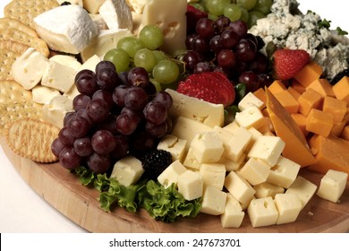 assorted fruit and cheeses with crackers ,shallow dof - Powered by Shutterstock