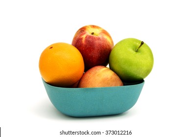 Assorted fruits in plate, isolated, white background - Powered by Shutterstock