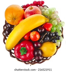 Assorted Fruits In Wicker Basket Top View Surface Isolated On White