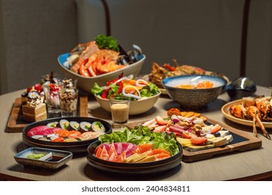 Assorted gourmet seafood and desserts on dining table. Fine dining and cuisine. - Powered by Shutterstock