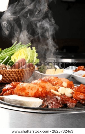 Assorted grilled beef intestines, including tripe, abomasum, and rectum, a Korean delicacy.