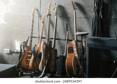 Assorted Guitars in Modern Music Studio - Powered by Shutterstock