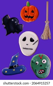 Assorted Halloween Cookies On Purple Background