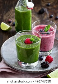 Assorted healthy smoothies in glasses - Shutterstock ID 496747630