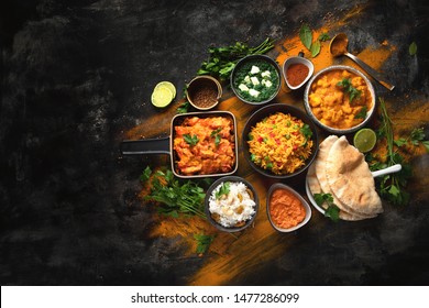 Assorted indian food on black background.. Indian cuisine. Top view with copy space - Shutterstock ID 1477286099
