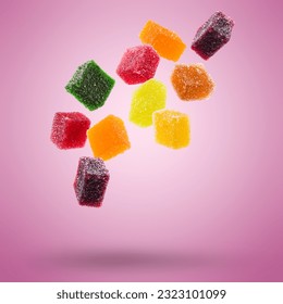 assorted jelly candies floating on colored background. - Powered by Shutterstock