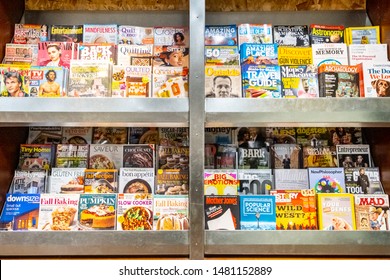 Assorted magazines for sale in a bookstore shelf