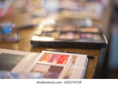 Assorted makeup products macro with shallow depth of field. Natural light