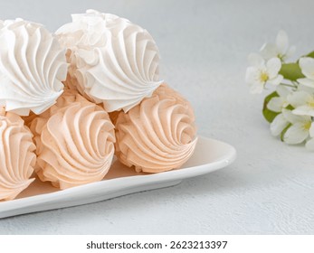 Assorted marshmallows for breakfast with a cup of fragrant coffee