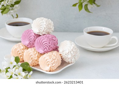 Assorted marshmallows for breakfast with a cup of fragrant coffee