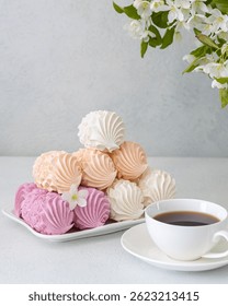 Assorted marshmallows for breakfast with a cup of fragrant coffee