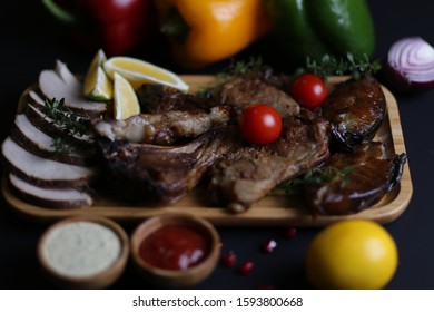 Assorted Meat Spread On A Wooden Plate
