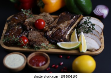 Assorted Meat Spread On A Wooden Plate