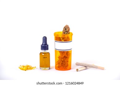 Assorted Medical Cannabis Products, Pills And CBD Oil Isolated Over White Background